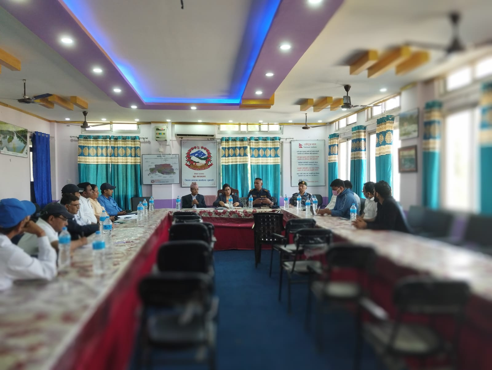 District monitoring and evaluation committee meeting.